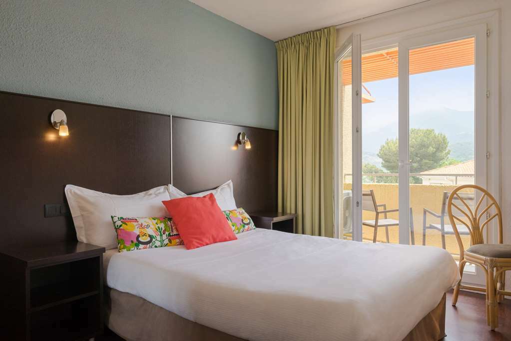 Hotel The Originals Perpignan Sud Le Grillon D'Or لو بولو الغرفة الصورة